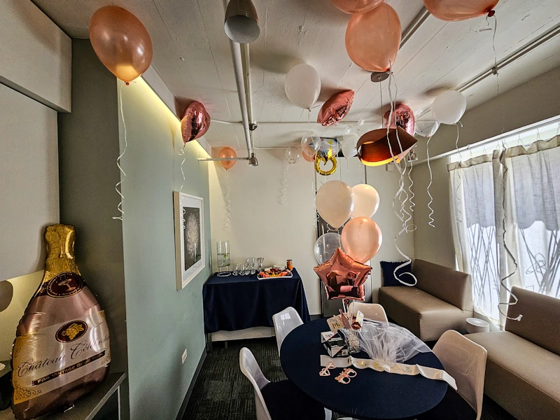 Balloons, party favors, streamers, fruit tray in the Private Sanctuary room at SpaSpace Chicago Day Spa